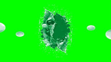 Soyut arkaplan, yeşil arkaplandaki sıçramalarla vurgulanan, limon renkli bir mürekkep damlasından oluşan bir sıçramadır.