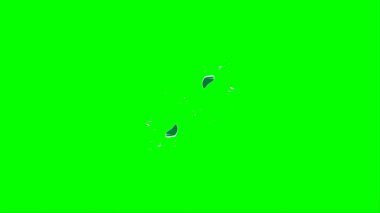 Soyut arkaplan, yeşil arkaplandaki sıçramalarla vurgulanan, limon renkli bir mürekkep damlasından oluşan bir sıçramadır.