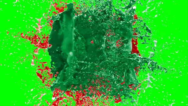 Soyut arkaplan bir damla kireç ve kırmızı mürekkep ile oluşturulan bir sıçramadır, yeşil arka plandaki sıçramalarla vurgulanır.