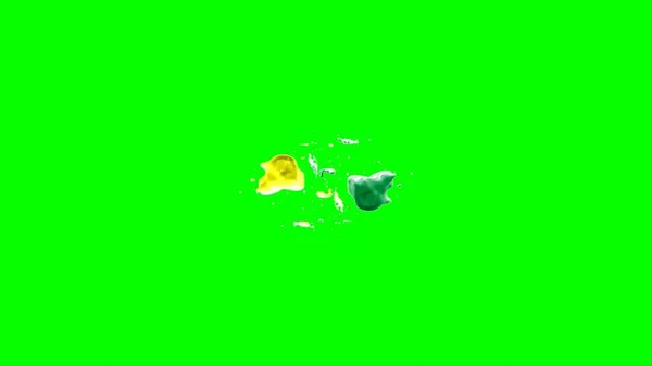 抽象的な背景は緑と黄色のインクの滴によって作成されたスプラッシュであり 緑の背景にスプラッシュによって強調表示されます 色インクの爆発の凍結運動 — ストック写真