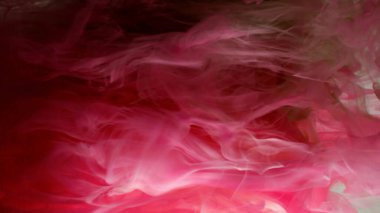 Suyun altında dönen kestane rengi suluboya arka plan. Renkli soyut patlama etkisi. Kırmızı şarabın rengi