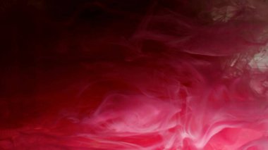 Suyun altında dönen kestane rengi suluboya arka plan. Renkli soyut patlama etkisi. Kırmızı şarabın rengi