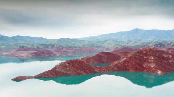 Aerial flight Beautiful spring landscape of river with blue turquoise water and hills against background of mountains and dawn sky. Bare rocky shores are visible due to ow water level on the lake. — Stock Video
