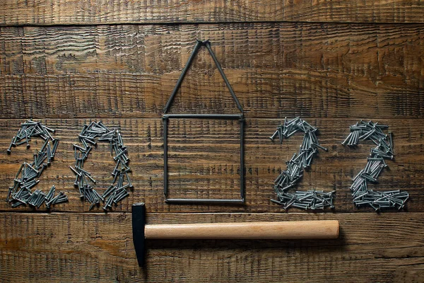 Yeni yılın tarihi çivilerden. Yeni yılda inşaat, ipotek, bankacılık hizmetleri kavramı