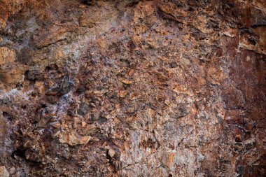 Kra bi Tayland adasındaki kaya uçurumunun doku detayları.