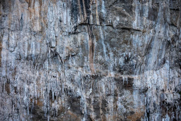 Kra bi Tayland adasındaki kaya uçurumunun doku detayları.