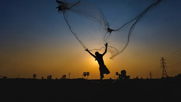 Action Fisherman Silhouete Sunrise Blue Sky Gold Background — Stock Photo, Image