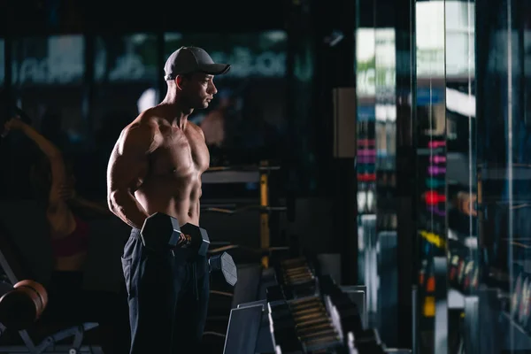 Sports Foreign Man Standing Working Out Dumbbells Gym Cinematic Tone — Stock Photo, Image