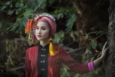 thai model in karen stand photographed in streams waterfalls middle forest