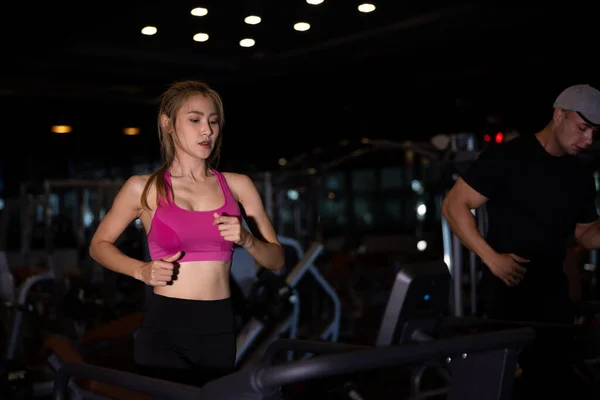 Couple Young Women Asian White Man Walking Running Gym Treadmill — Stockfoto