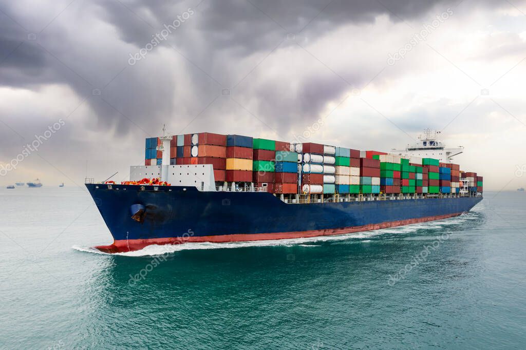 container ship sailing to transport goods in containers for import export internationally and worldwide, business services transportation by container ship open sea, front view from drone, and storm background,