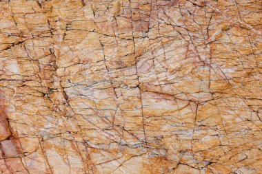 Doğal kırık kayaların dokuları ve desenleri ve zamanla deniz suyunun aşınması, arka plan soyutlaması için.