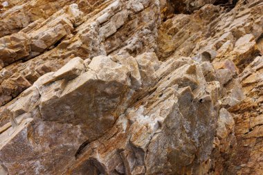 Doğal kırık kayaların dokuları ve desenleri ve zamanla deniz suyunun aşınması, arka plan soyutlaması için.