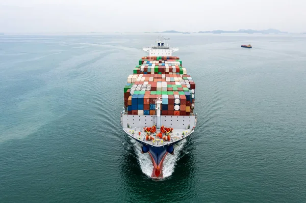 Big size container ship full speed sailing in deep sea for transporting cargo logistic import and export goods internationally around the world, including Asia Pacific and Europe, business and industry delivery service transportation concept, front v