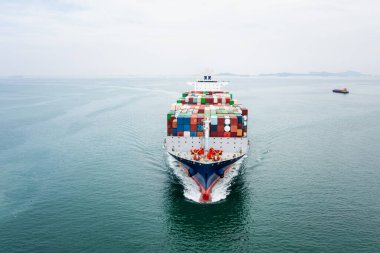 cargo container ship sailing in sea import and export business and industry logistic goods transportation of international by container ship in ocean fright aerial view photograph from drone 