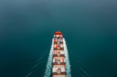 cargo container ship sailing in sea import and export business and industry logistic goods transportation of international by container ship in ocean fright aerial view photograph from drone 