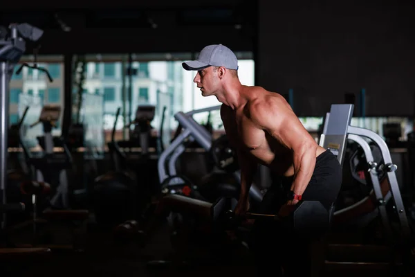 Muscular Man Working Out Dumbbells Gym Dark Tone — Stockfoto