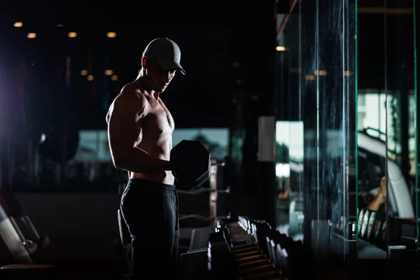Muscular Man Working Out Dumbbells Gym Dark Tone — Fotografia de Stock