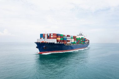 cargo container ship sailing in sea import and export business and industry logistic goods transportation of international by container ship in ocean fright aerial view photograph from drone 