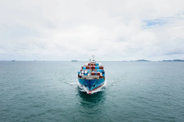 container ship to import export marine goods to dealers and consumers across the pacific and around the world, businesses and industries Ocean freight forwarding, aerial view