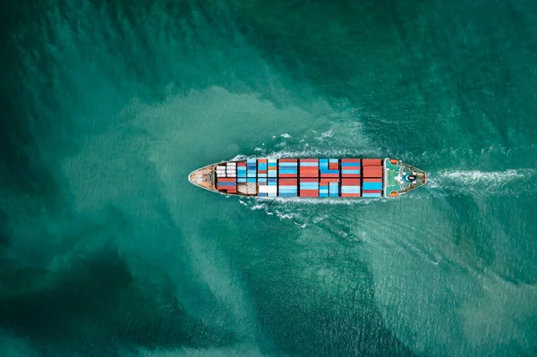 container ship to import export marine goods to dealers and consumers across the pacific and around the world, businesses and industries Ocean freight forwarding, aerial top view