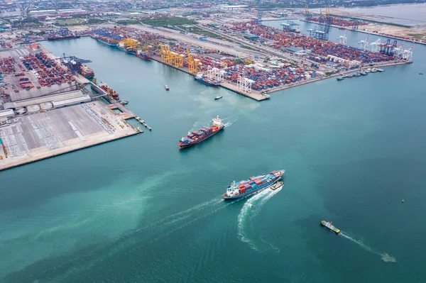 Container ship transporting cargo logistic import export goods internationally around the world, distribution to dealer and customer, business and industry delivery service logistic transportation by container ship in open sea, Aerial view