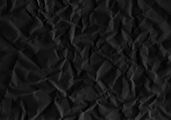 Crumpled paper texture. Crumpled black paper texture background. High resolution texture. Crumpled black paper.