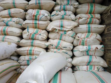 piles of animal feed sold in the market
