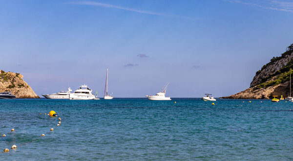 Cala Llonga with turquoise water, Ibiza island, Balearic Islands, Spain, popular with tourists