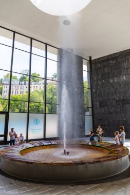 Karlovy Vary, Bohemia, Czech Republic - August 6, 2022, The Fontana Vridlo Sprudel or Vridlo Fountain in the colonnade of the hot spring or Vridelni Kolonada in Karlovy Vary.