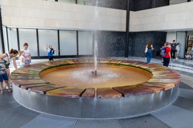 Karlovy Vary, Bohemia, Czech Republic - August 6, 2022, The Fontana Vridlo Sprudel or Vridlo Fountain in the colonnade of the hot spring or Vridelni Kolonada in Karlovy Vary.