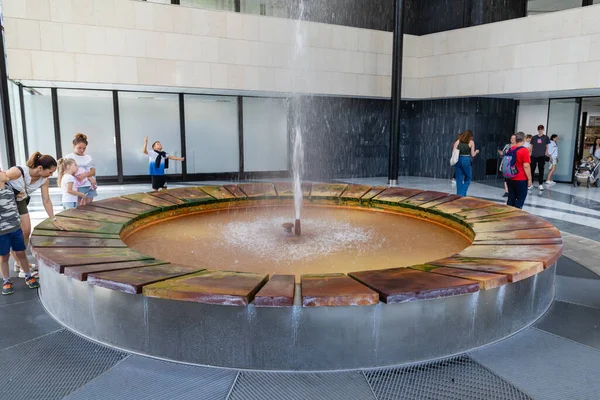 Karlovy Vary, Bohemia, Czech Republic - August 6, 2022, The Fontana Vridlo Sprudel or Vridlo Fountain in the colonnade of the hot spring or Vridelni Kolonada in Karlovy Vary.