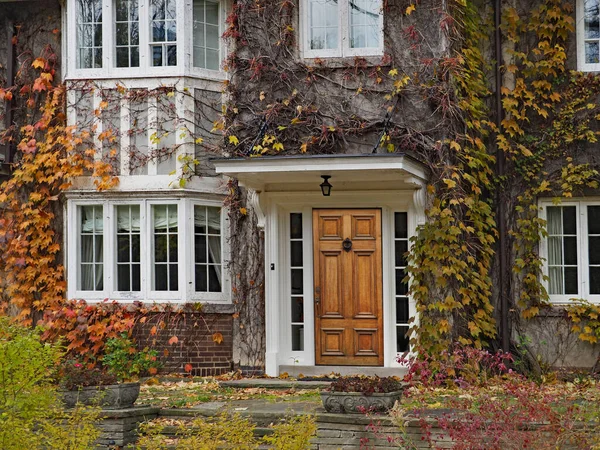 old house with vines in fall