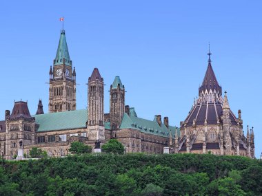 View of the Canadian Parliament Building from across the Rideau Canal, with the circular library at the right clipart