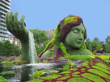 OTTAWA - AUGUST 2018:  Jacques Cartier park has a display of unique topiary sculptures made up of thousands of tiny plants. clipart