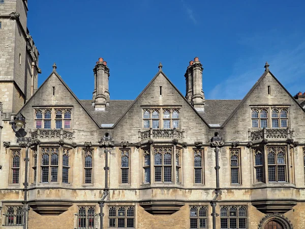 OXFORD, ENGLAND -   Oxford University, the facade a college building facing the High Street