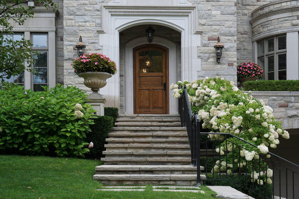 Front door with hydrangea bushes in summer