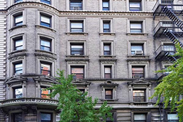 Elegant old New York apartment building with external fire escape