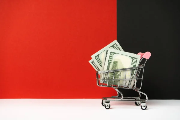 Trolley Met Geld Concept Zwarte Vrijdag Winkelen Voor Lol Uitgaven — Stockfoto