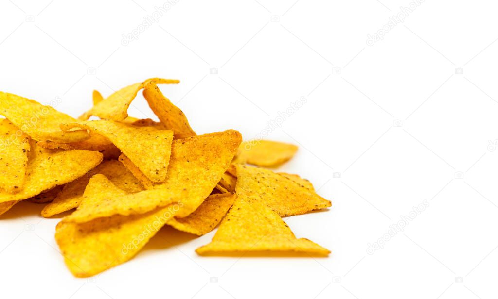 The nachos chips on a white background. Fast food.