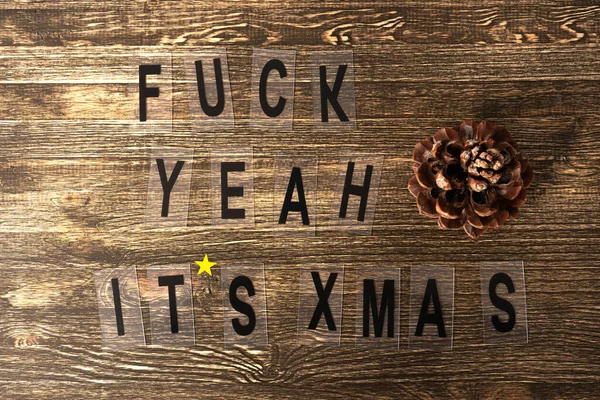 Christmas Background Inscription Fuck Yeah Xmas Stone Pine Cone Wood —  Fotos de Stock