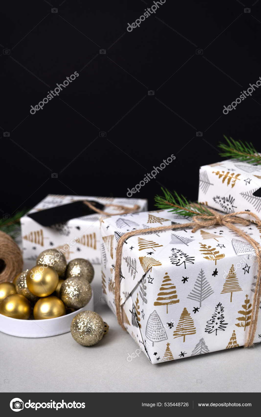 Christmas Gifts White Wrapping Paper Ornatent Spruce Sprig Black Tags Stock  Photo by ©The_Atlas 535448726