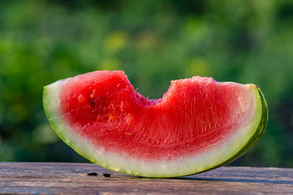Delicious Refreshing Watermelon Outdoors Wooden Table Green Natural Background Slice — 스톡 사진