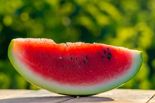 Delicious Refreshing Watermelon Outdoors Wooden Table Green Natural Background Slice — 스톡 사진