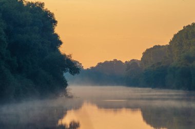 Early morning river.  fog trees. sunlight mist  water. Olanesti Moldova Dniester river reflection, beautiful   summer landscape sunrise quiet fishing spot forest