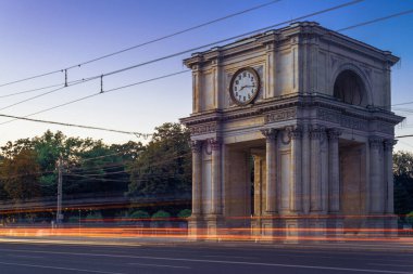 CHISINAU, MOLDOVA - august 20, 2022: Triumphal Arch sunset beautiful light monument national square Victory European Capital center city long exposure