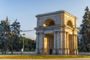 CHISINAU, MOLDOVA - august 20, 2022: Triumphal Arch sunset beautiful light monument national square Victory European Capital center city long exposure