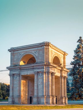 CHISINAU, MOLDOVA - august 20, 2022: Triumphal Arch sunset beautiful light monument national square Victory European Capital center city long exposure