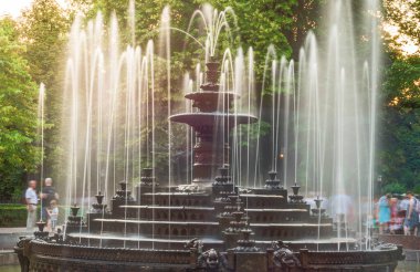 Old Water fountain in the Stefan cel Mare park in the center of Chisinau, capital of Moldova, Eastern Europe beautiful sunset