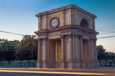 CHISINAU, MOLDOVA - august 20, 2022: Triumphal Arch sunset beautiful light monument national square Victory European Capital center city long exposure